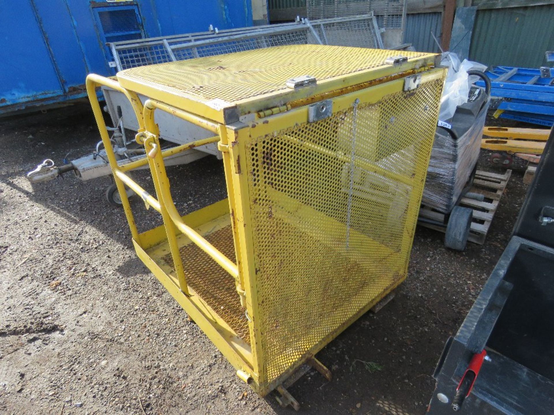 FOLDING TOP MANCAGE FOR FORKLIFT. THIS LOT IS SOLD UNDER THE AUCTIONEERS MARGIN SCHEME, THEREFOR