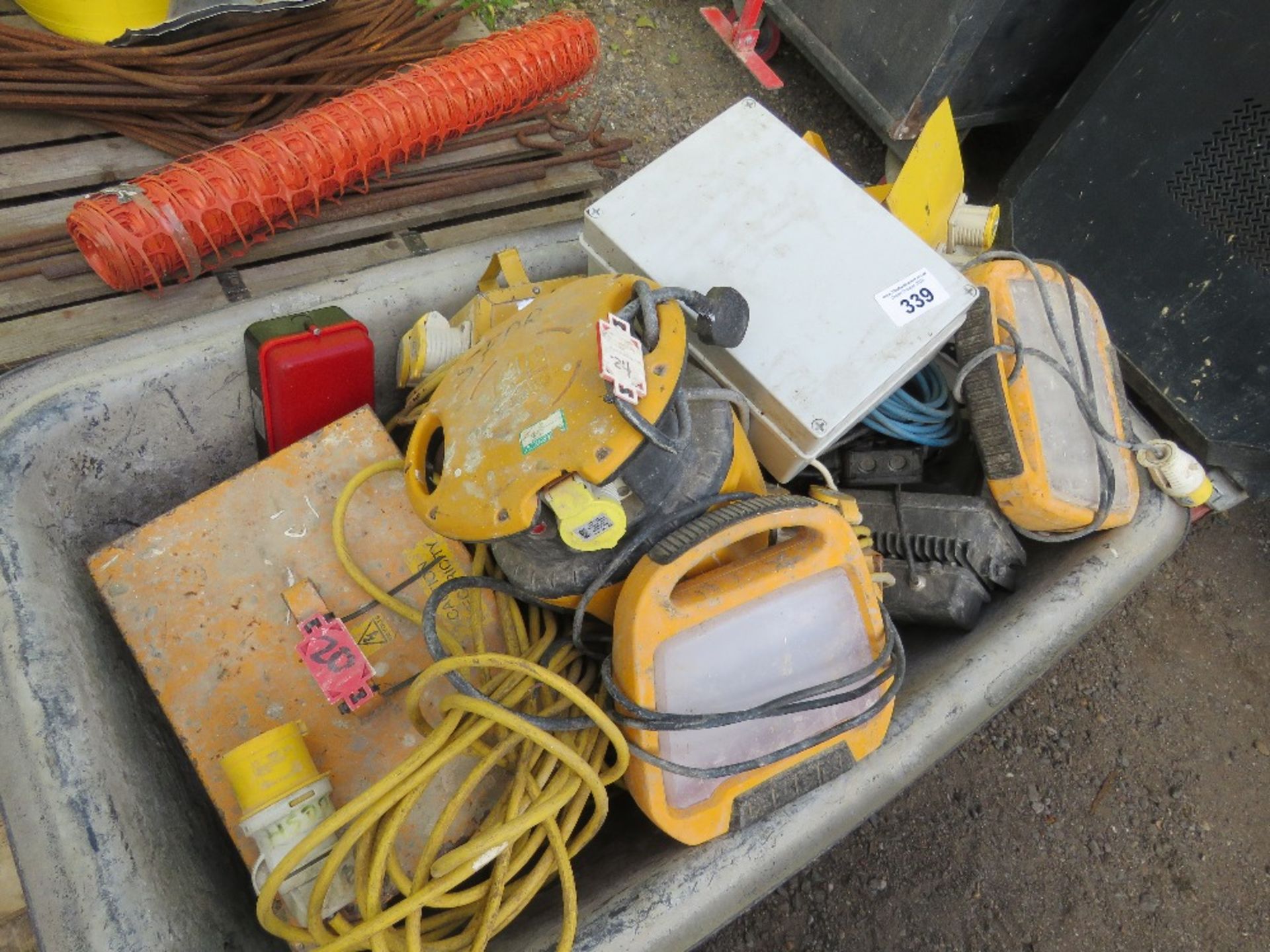 BIN CONTAINING 110VOLT LIGHTS, JUNCTION BOXES PLUS A TRANSFORMER. THIS LOT IS SOLD UNDER THE AUCT