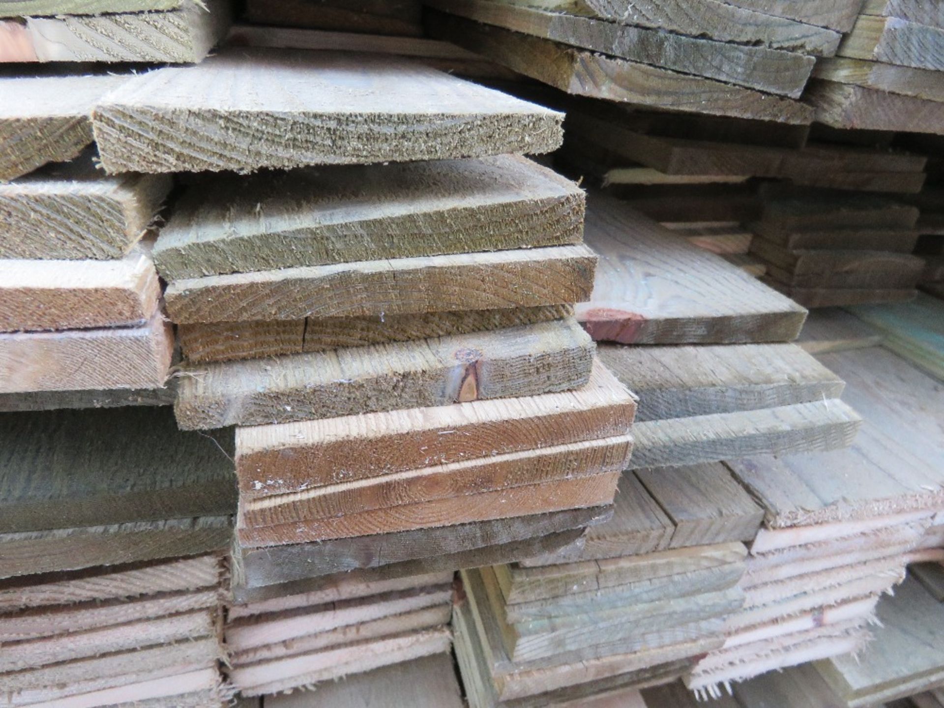 LARGE PACK OF PRESSURE TREATED FEATHER EDGE FENCE CLADDING TIMBER BOARDS. MIXED 1.7-1.9M LENGTH X 10 - Image 3 of 3