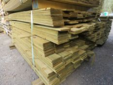 LARGE PACK OF TREATED FEATHER EDGE TIMBER CLADDING BOARDS: 1.4-1.8M LENGTH X 100MM WIDTH APPROX.