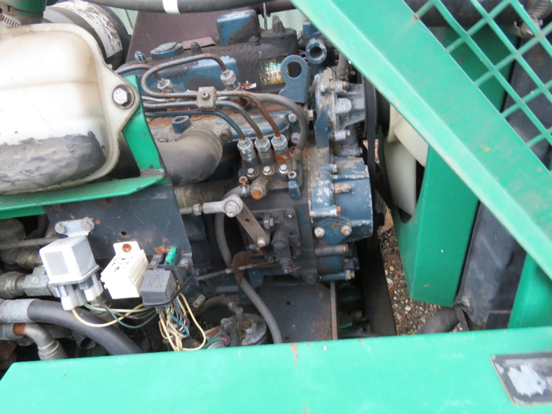 RANSOMES TRIPLE RIDE ON MOWER WITH KUBOTA ENGINE. BEEN IN STORAGE FOR SOME TIME. WHEN BRIEFLY TESTED - Image 6 of 7