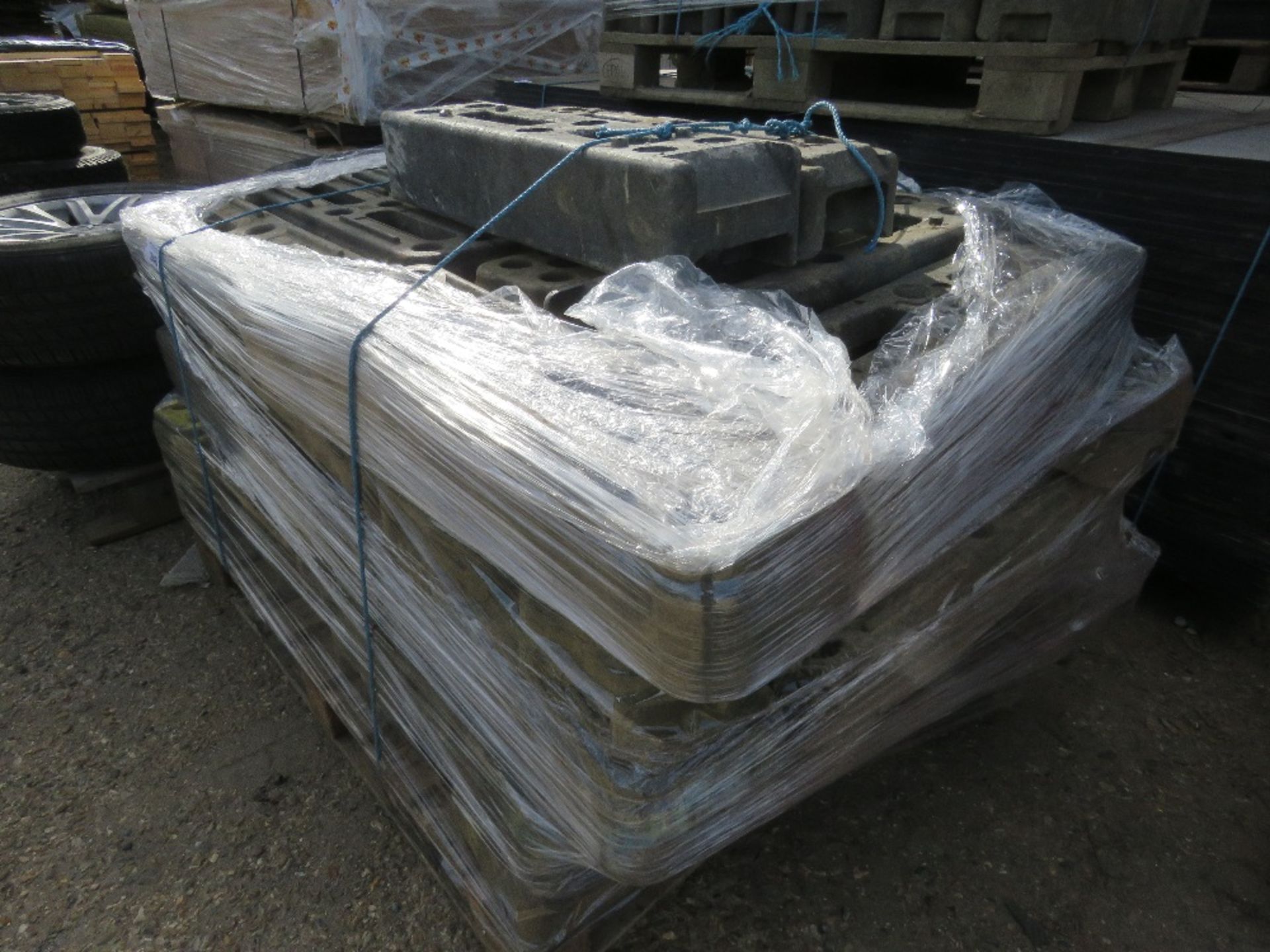 PALLET OF HERAS TYPE TEMPORARY FENCE BLOCKS, DIRECT FROM SITE CLEARANCE. THIS LOT IS SOLD UNDER T