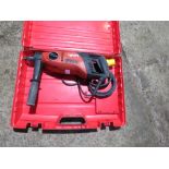 HILTI DD110 DIAMOND DRILL IN A CASE.