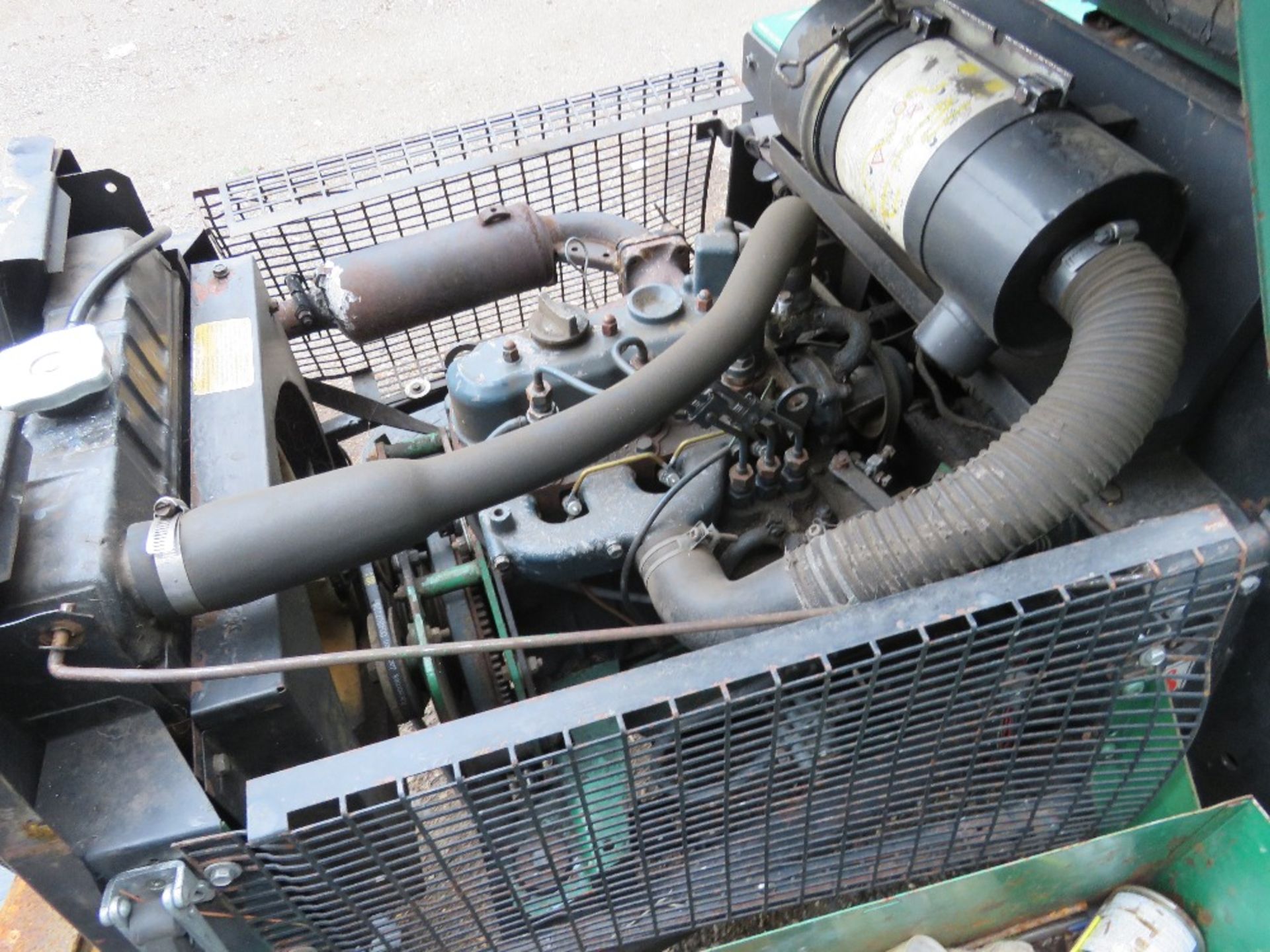 RANSOMES TRIPLE RIDE ON MOWER WITH KUBOTA ENGINE. BEEN IN STORAGE FOR SOME TIME. WHEN BRIEFLY TESTED - Image 2 of 5