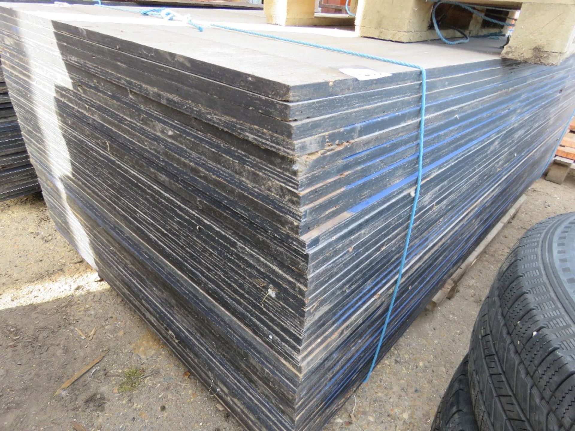 BUNDLE OF 40NO SHEETS OF 18MM PLYWOOD, BLUE PAINTED ON ONE SITE, DIRECT FROM SITE CLEARANCE. THI