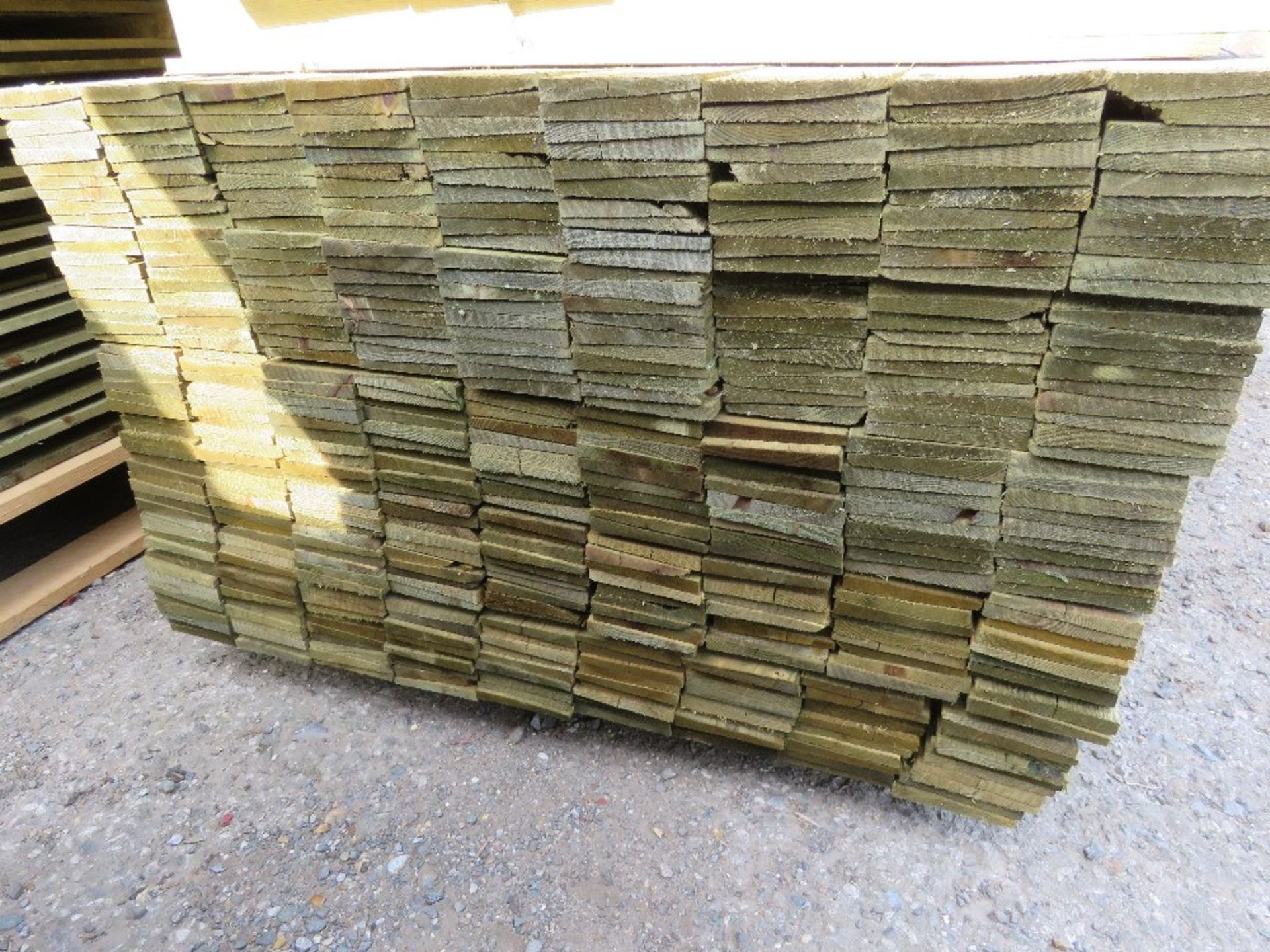 LARGE PACK OF PRESSURE TREATED FEATHER EDGE FENCE CLADDING TIMBER BOARDS. 1.8M LENGTH X 100MM WIDTH - Image 2 of 3