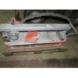 TILE CUTTING SAWBENCH WITH LEGS, 240VOLT POWERED. THIS LOT IS SOLD UNDER THE AUCTIONEERS MARGIN S