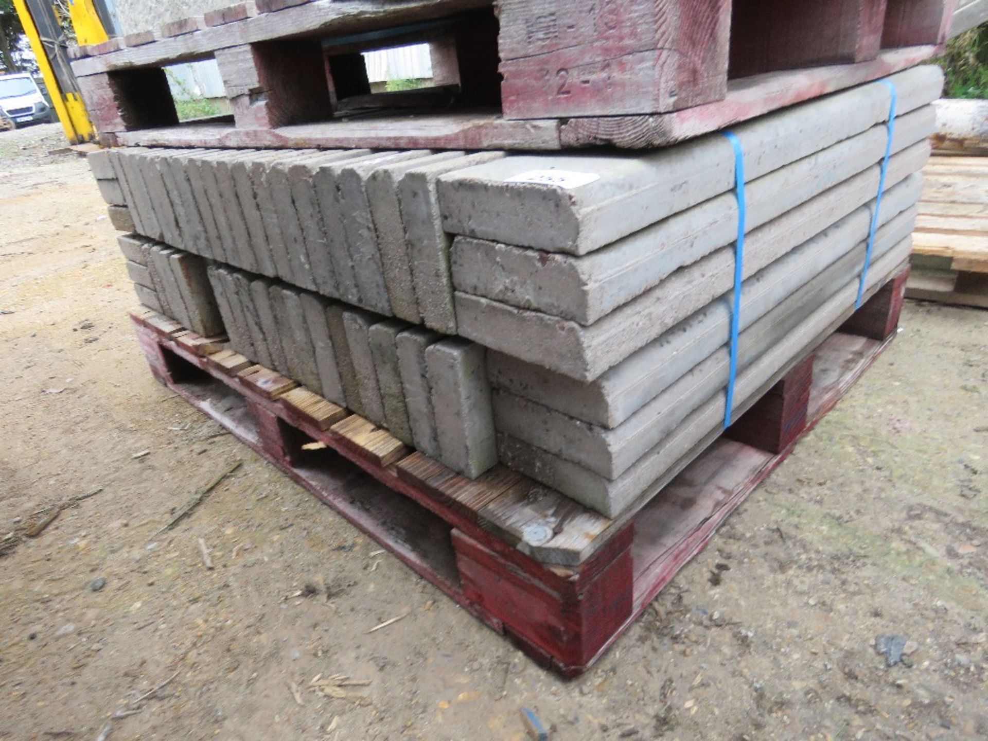 PALLET CONTAINING 48NO CHAMFERRED EDGE CONCRETE EDGING KERBS. 2" X 6" X 36" APPROX.