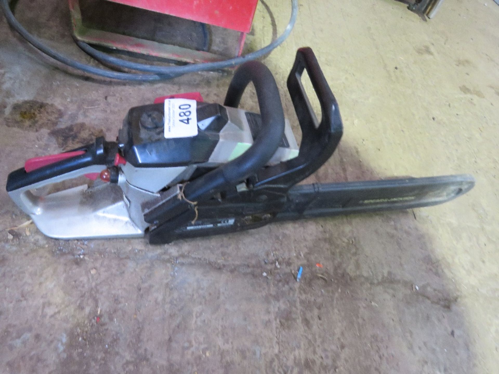 PETROL ENGINED CHAINSAW.