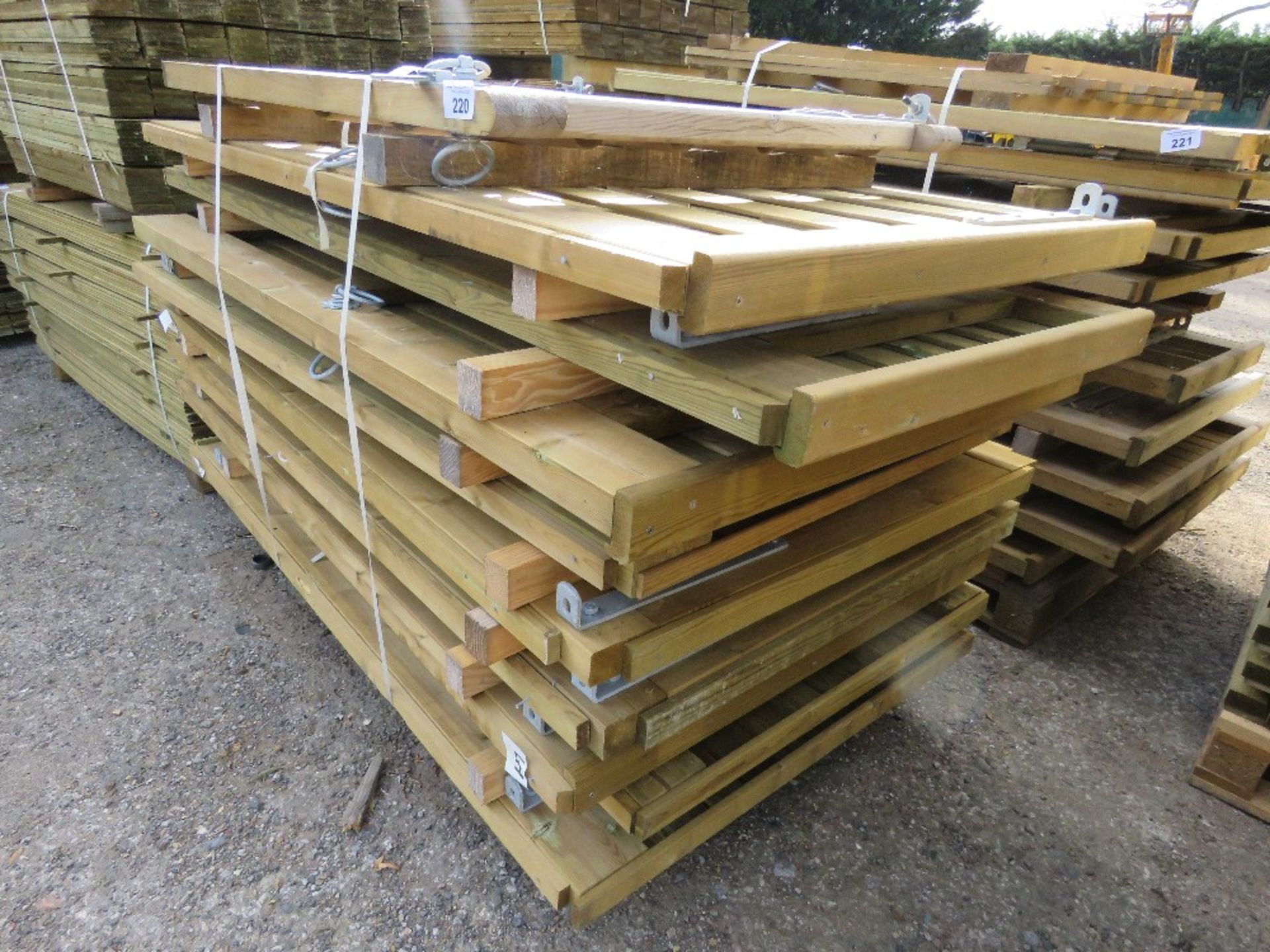 STACK OF 10NO ASSORTED WOODEN GARDEN GATES.