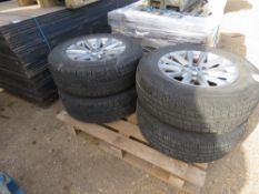 4NO MITSUBISHI 4WD ALLOY WHEELS AND TYRES 245/65R17 SIZE. THIS LOT IS SOLD UNDER THE AUCTIONEERS MAR
