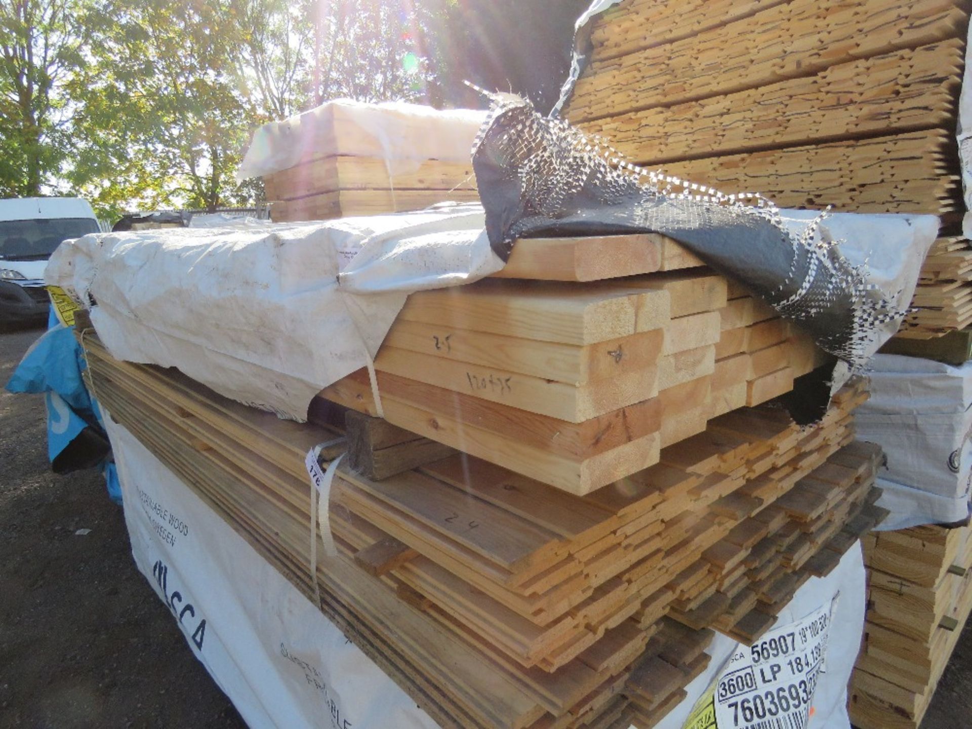 PACK OF UNTREATED TIMBER BOARDS WITH ROUNDED EDGES. 2.5M LENGTH X 35MM 120MM WIDTH APPROX.
