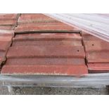 PALLET CONTAINING RED CONCRETE ROOF TILES.