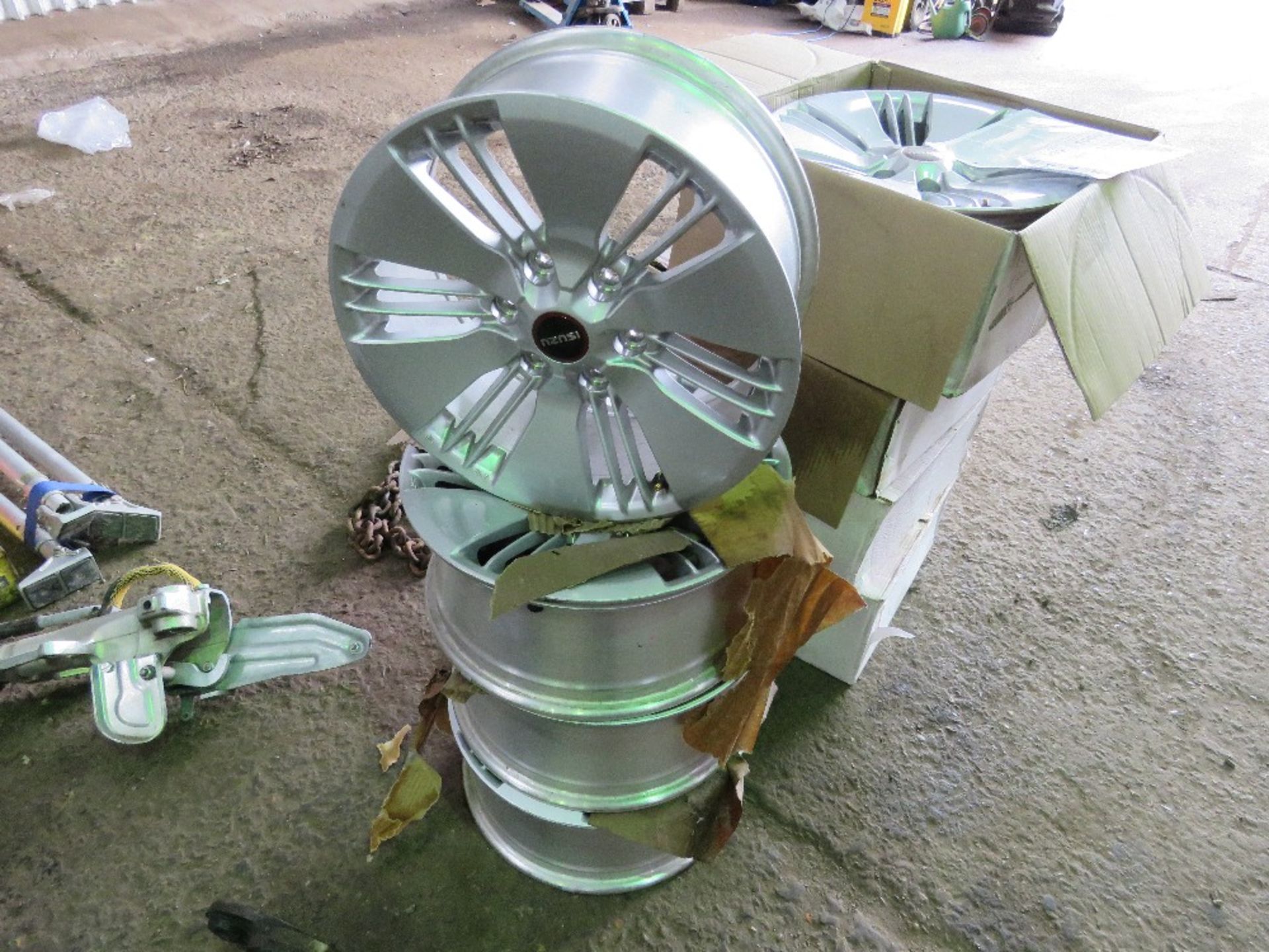 SET OF 4 NO. ISUZU 18.75J WHEEL ALLOY RIMS. IMMEDIATELY REMOVED AND REPLACED WITH DIFFERENT STYLE WH