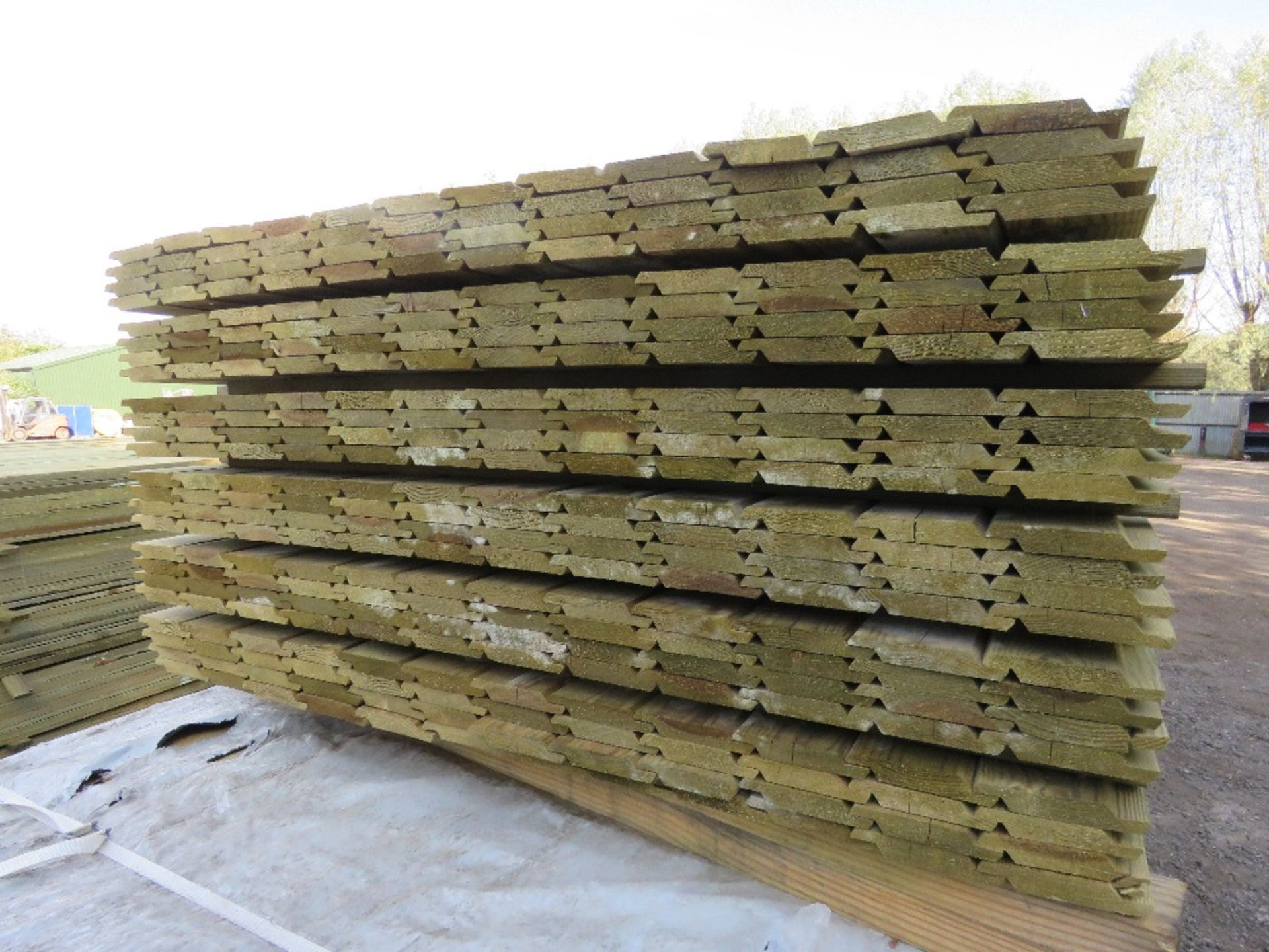 SMALL PACK OF PRESSURE TREATED SHIPLAP FENCE CLADDING TIMBER BOARDS. 1.42M LENGTH X 100MM WIDTH APPR - Image 2 of 3