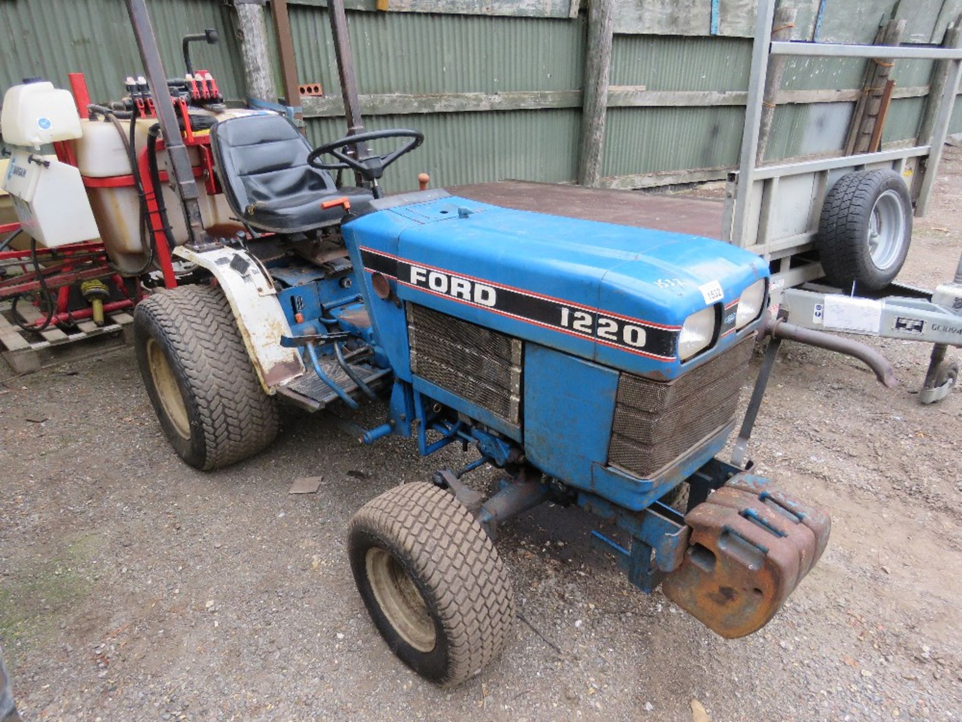 FORD 1220 4WD COMPACT TRACTOR ON GRASS TYRES. COMES WITH A BARGAM POG200/1106 TRACTOR MOUNTED CROP S