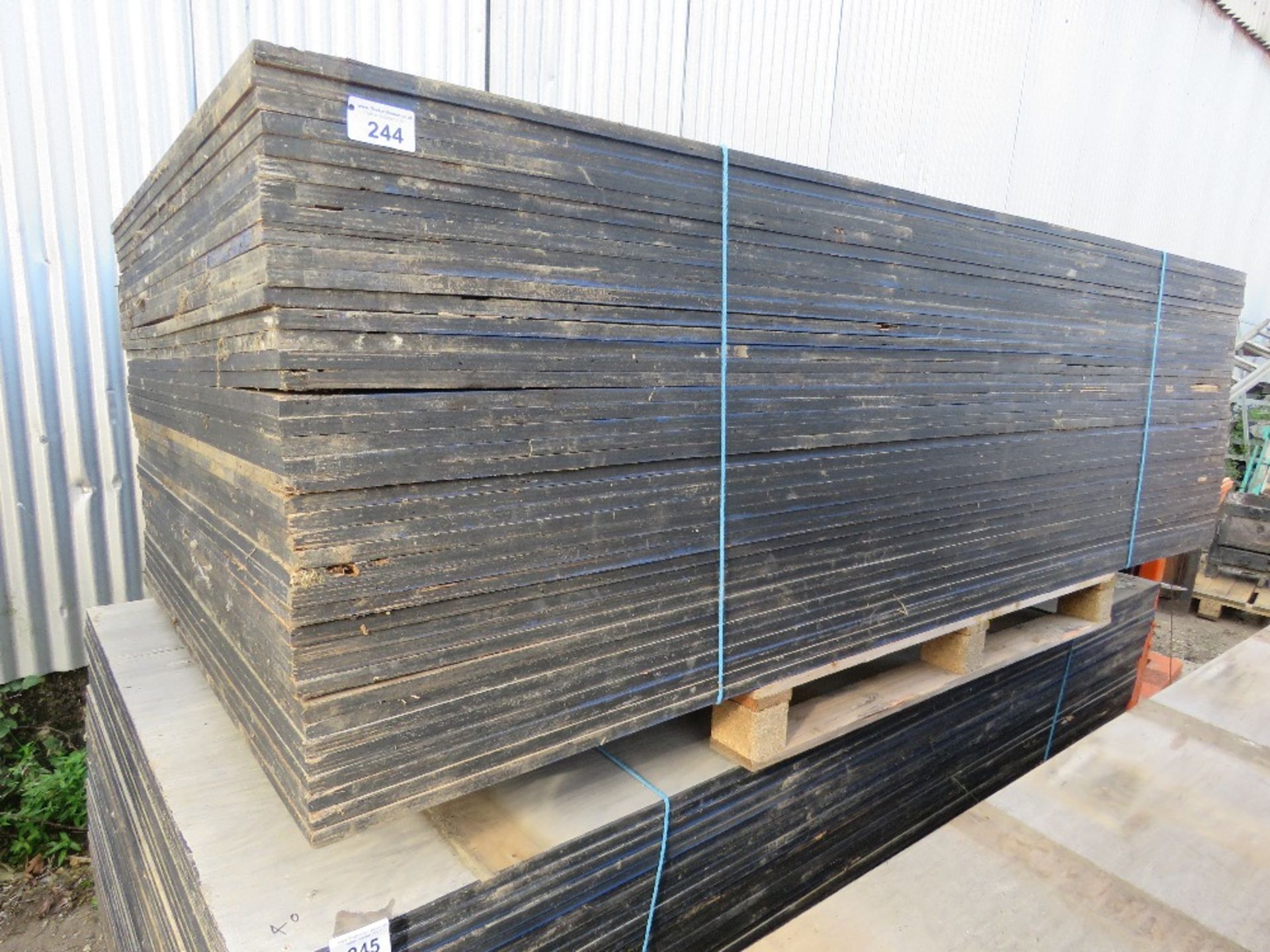 BUNDLE OF 40NO SHEETS OF 18MM PLYWOOD, BLUE PAINTED ON ONE SITE, DIRECT FROM SITE CLEARANCE. THI