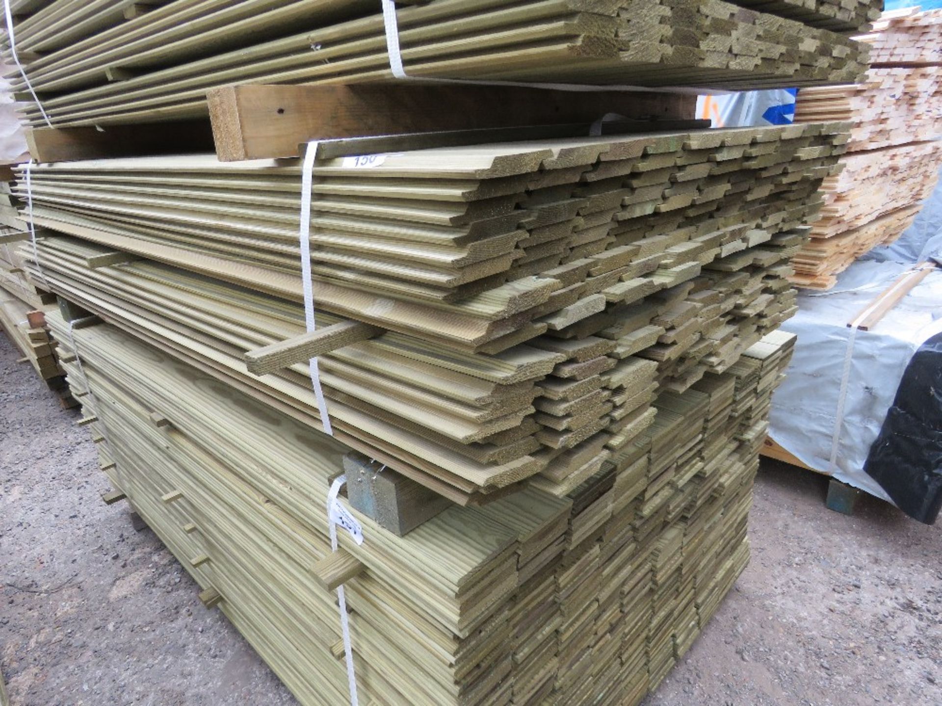 SMALL PACK OF PRESSURE TREATED SHIPLAP FENCE CLADDING TIMBER BOARDS. 1.83M LENGTH X 100MM WIDTH APPR