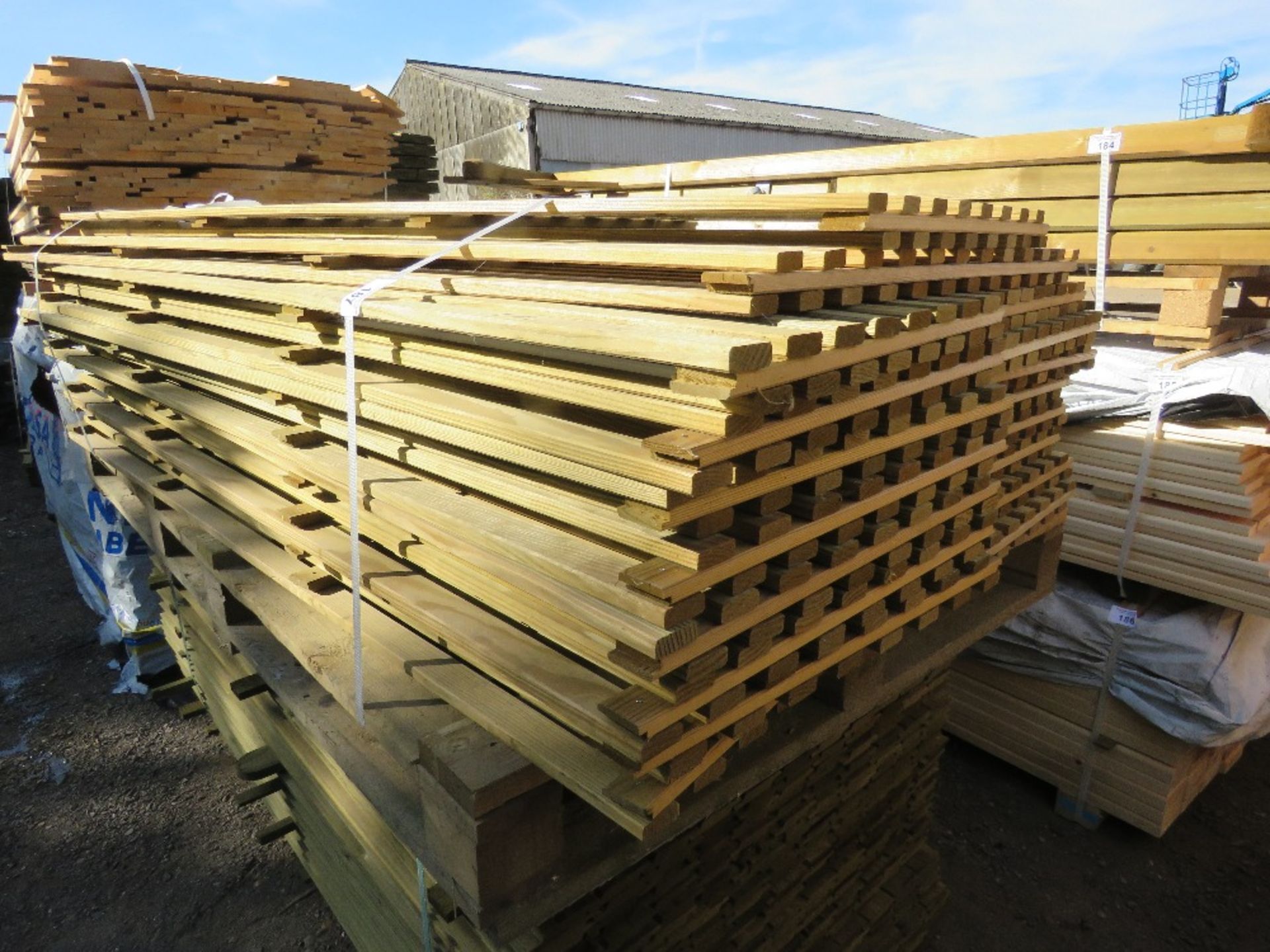 PACK OF TREATED TIMBER SLATTED FENCE PANELS 1.83M LENGTH APPROX.