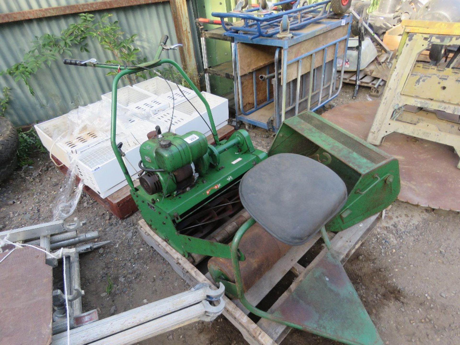 RANSOMES CYLINDER MOWER PLUS ROLLER SEAT AND BOX. THIS LOT IS SOLD UNDER THE AUCTIONEERS MARGIN S