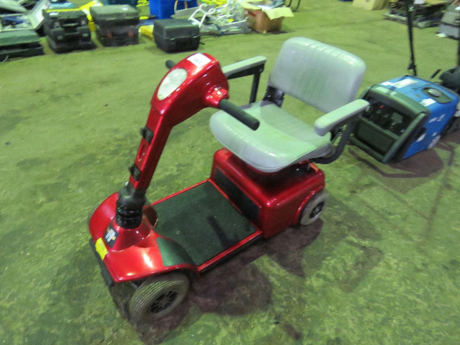 RALLY INVALID SCOOTER, NO KEY OR BATTERY. THIS LOT IS SOLD UNDER THE AUCTIONEERS MARGIN SCHEME,