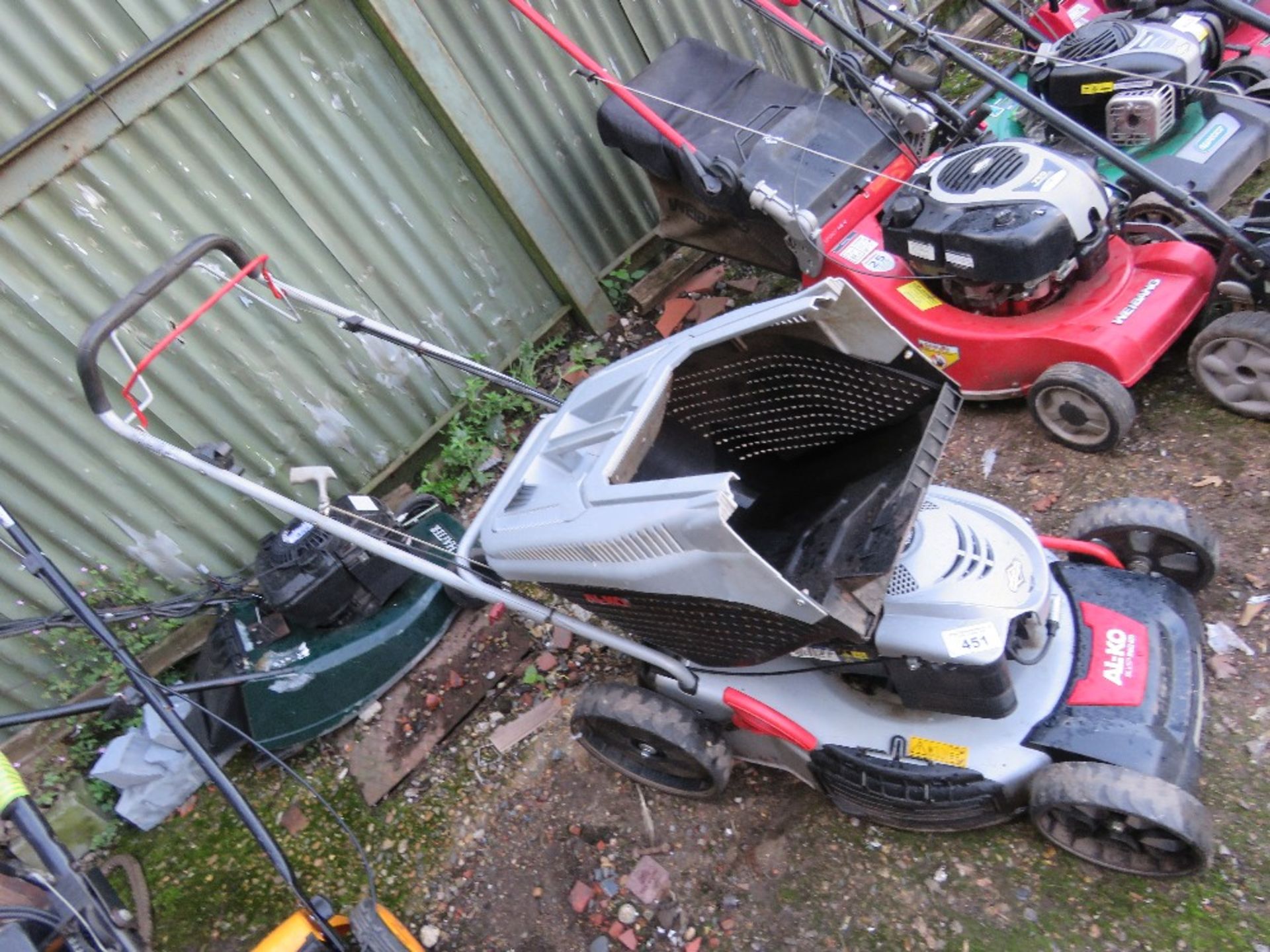 ALKO PETROL ENGINED ROTARY LAWNMOWER. WITH COLLECTOR. THIS LOT IS SOLD UNDER THE AUCTIONEERS MA