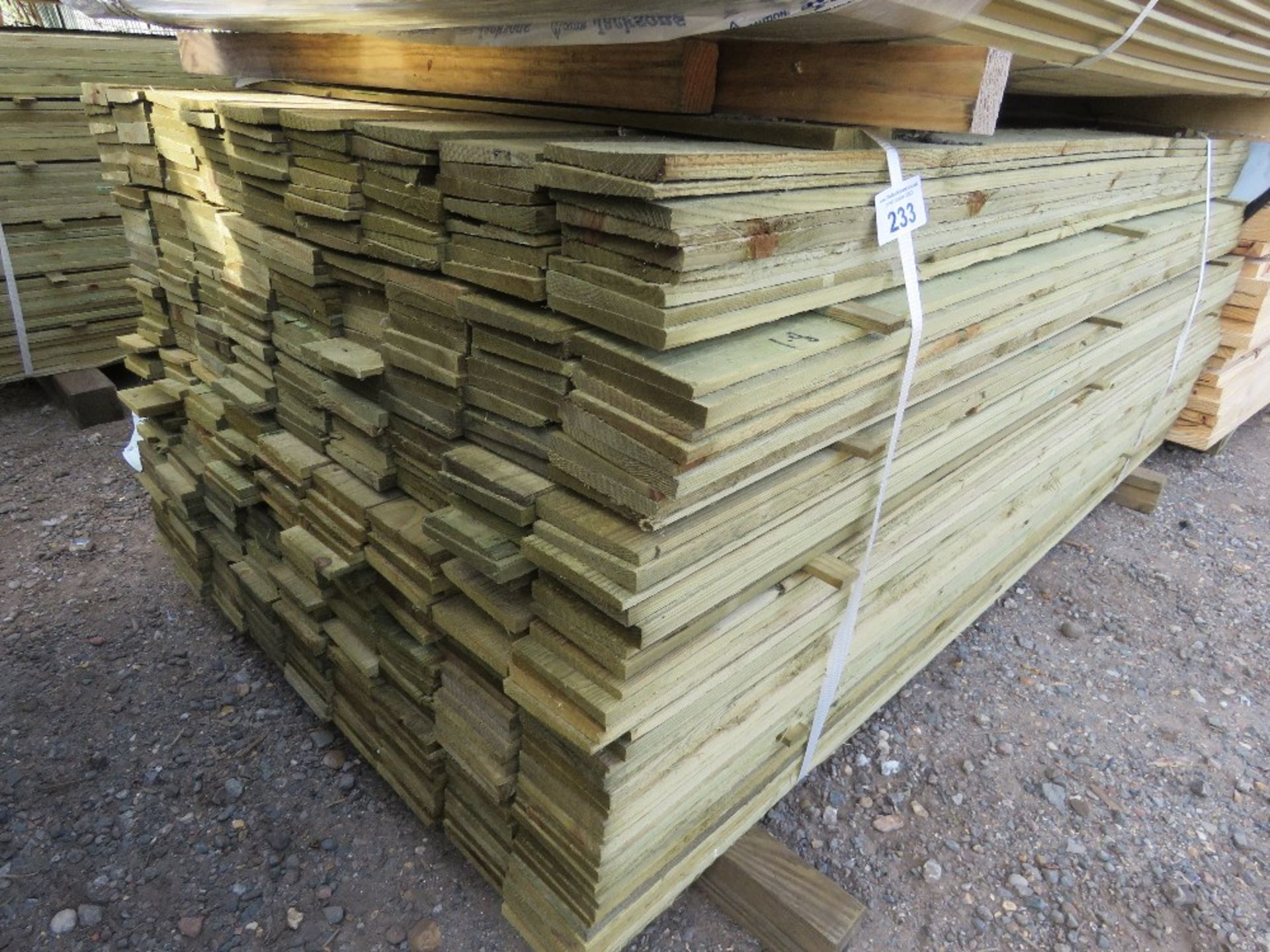 LARGE PACK OF PRESSURE TREATED FEATHER EDGE FENCE CLADDING TIMBER BOARDS. 1.80M LENGTH X 100MM WIDTH