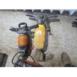 PNEUMATIC ROCK DRILL PLUS AN AIR BREAKER. THIS LOT IS SOLD UNDER THE AUCTIONEERS MARGIN SCHEME,