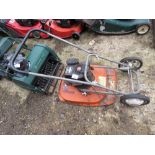 FLYMO HOVER MOWER WITH WHEELS. THIS LOT IS SOLD UNDER THE AUCTIONEERS MARGIN SCHEME, THEREFORE NO