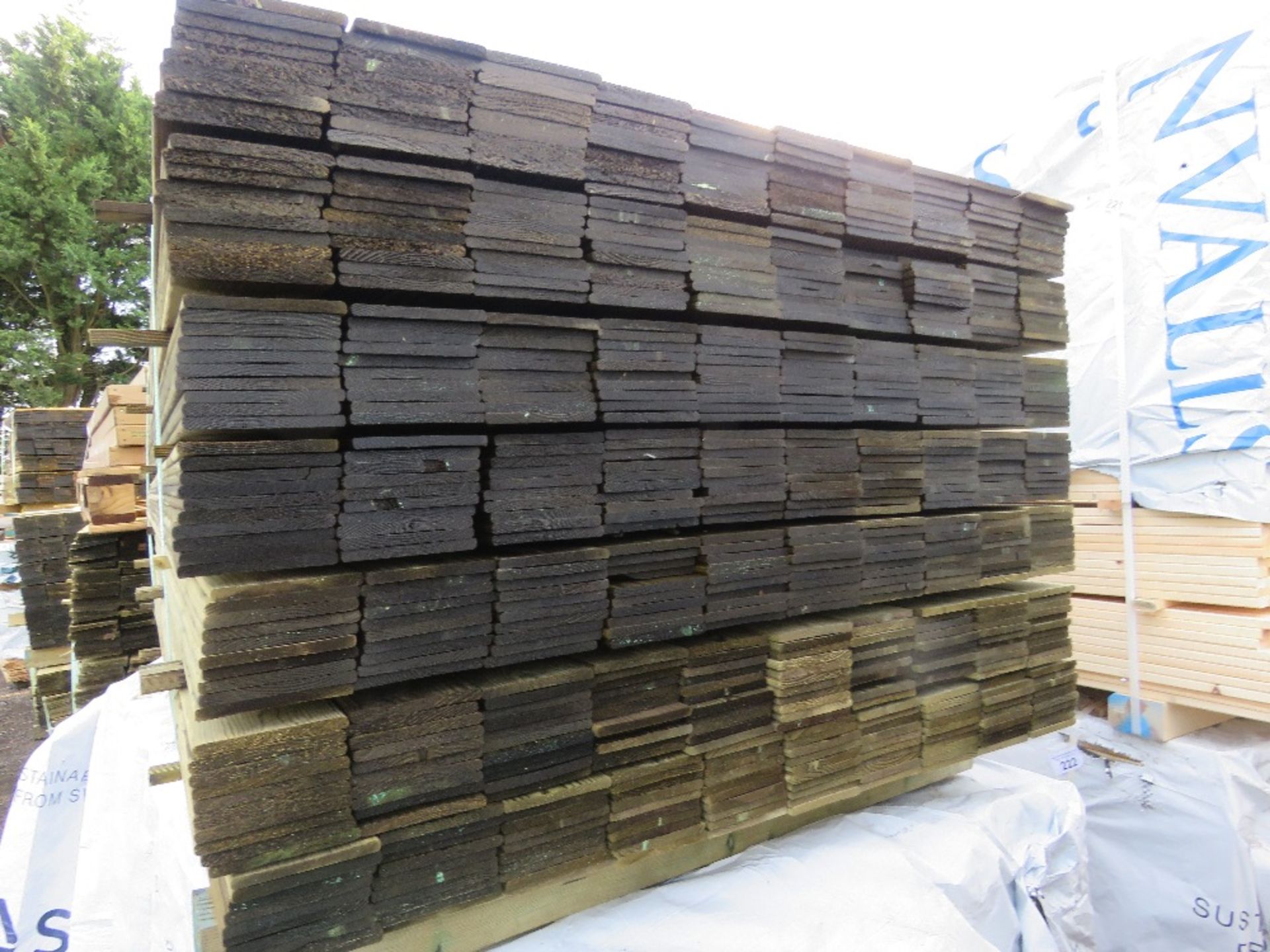 LARGE PACK OF TREATED HIT AND MISS TIMBER CLADDING BOARDS. 1.75M LENGTH X 100MM WIDTH APPROX. - Image 2 of 3