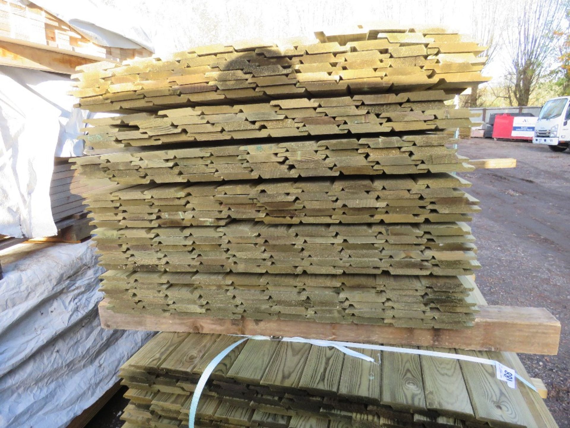 PACK OF PRESSURE TREATED SHIPLAP CLADDING TIMBER BOARDS. 100MM WIDTH APPROX. - Image 2 of 3