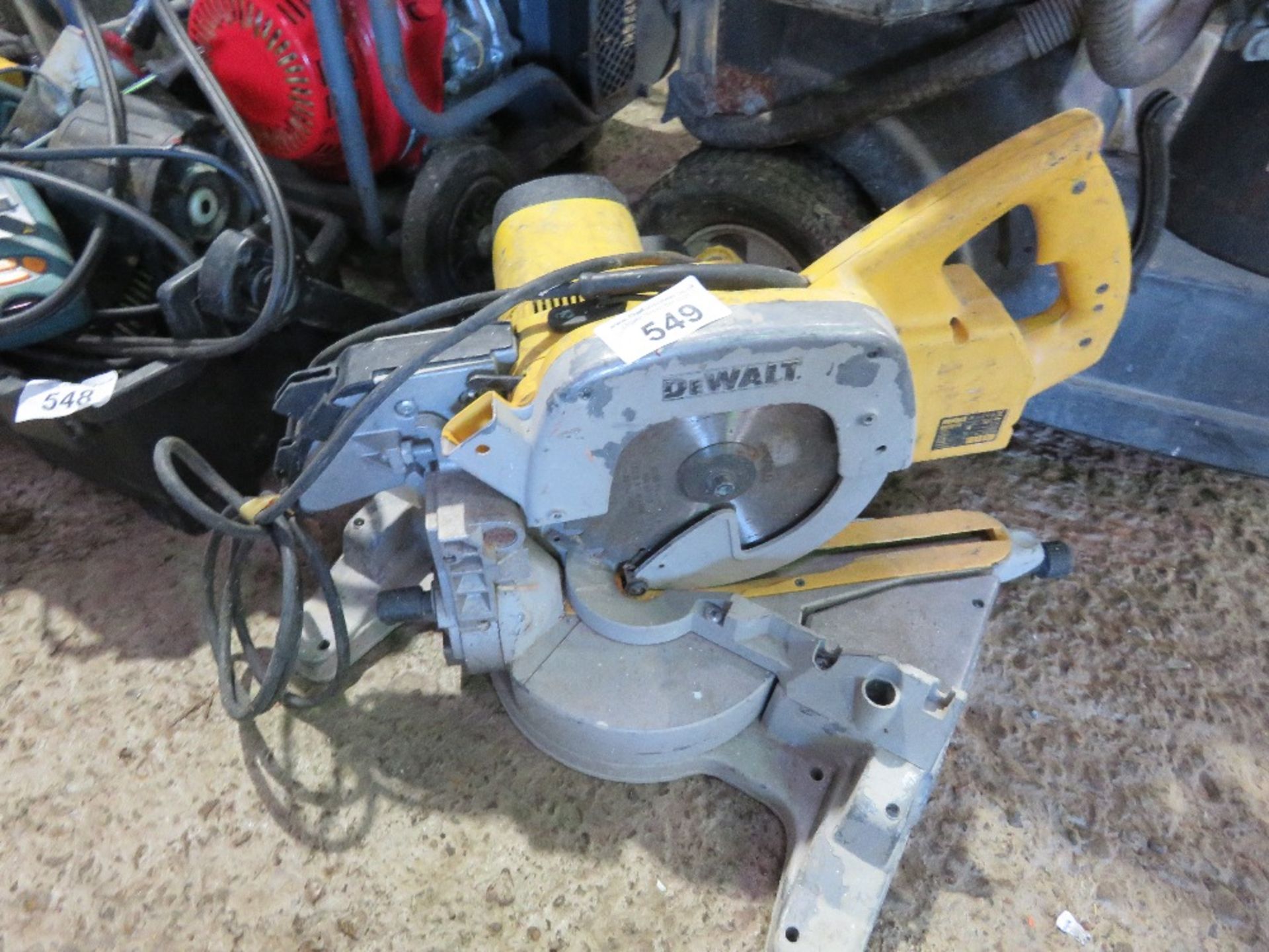 DEWALT 110V MITRE SAW. THIS LOT IS SOLD UNDER THE AUCTIONEERS MARGIN SCHEME, THEREFORE NO VAT WI