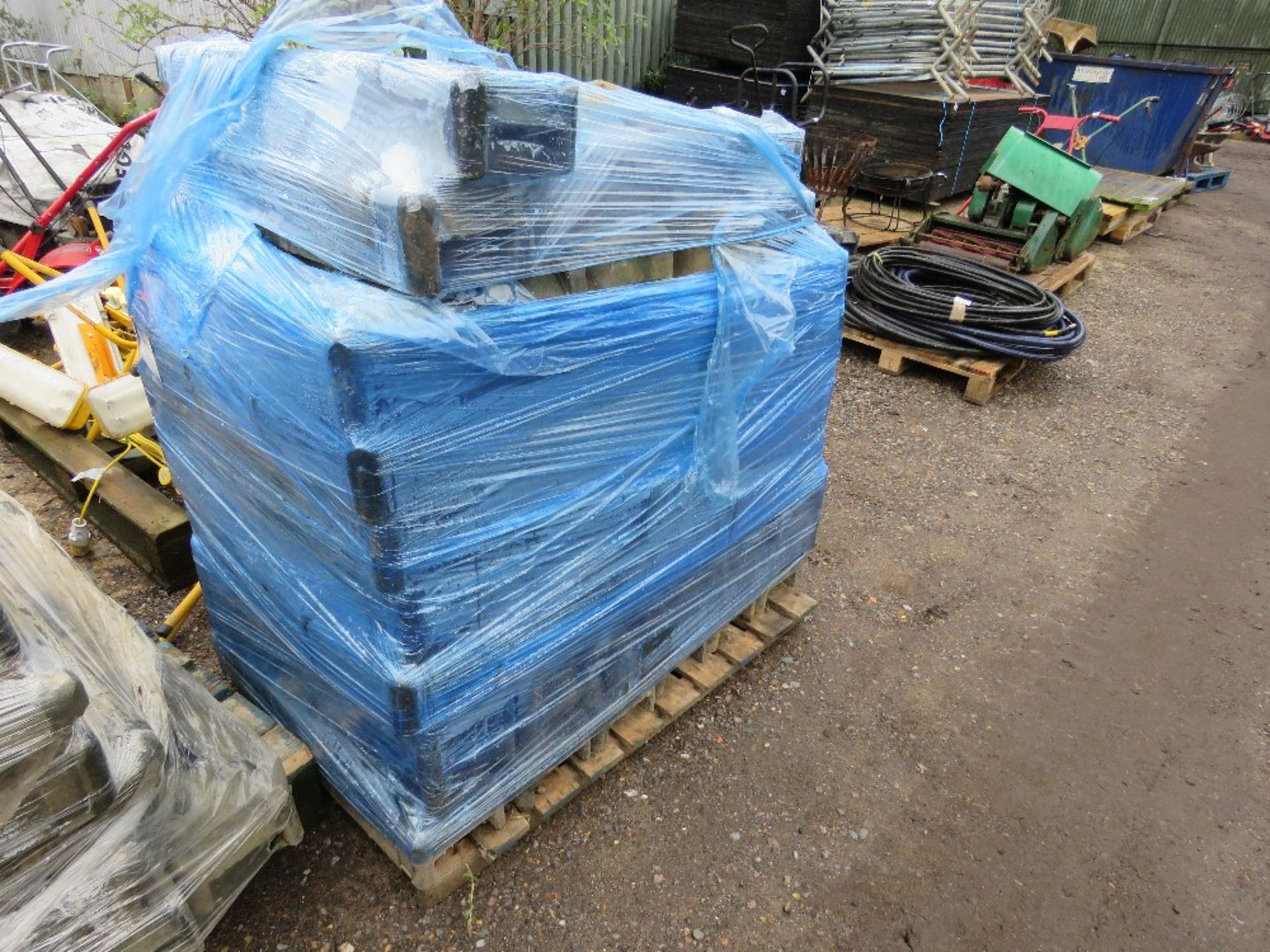 LARGE PALLET OF HERAS TYPE TEMPORARY FENCE BASES/BLOCKS. THIS LOT IS SOLD UNDER THE AUCTIONEERS M