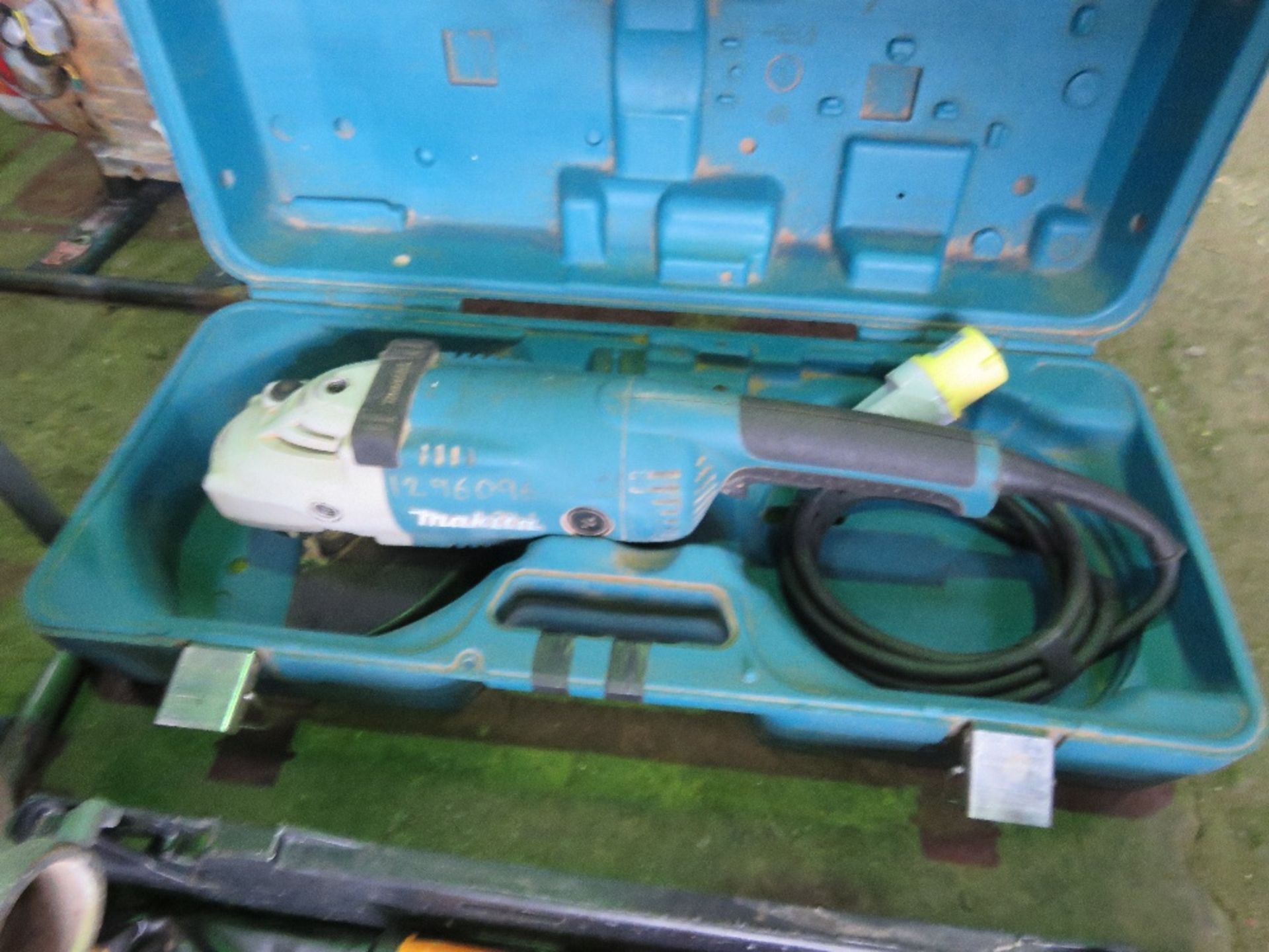 LARGE MAKITA 110V ANGLE GRINDER AND SPANNER SET.