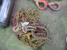 4 LEGGED LIFTING CHAINS WITH SHORTENERS. 12FT LENGTH APPROX. THIS LOT IS SOLD UNDER THE AUCTIONE
