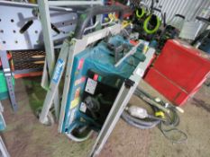 MAKITA 110VOLT SAWBENCH WITH FOLDING STAND AND WHEELS.