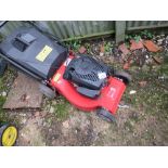 RED PETROL ENGINED LAWN MOWER, WITH BOX. THIS LOT IS SOLD UNDER THE AUCTIONEERS MARGIN SCHEME, TH