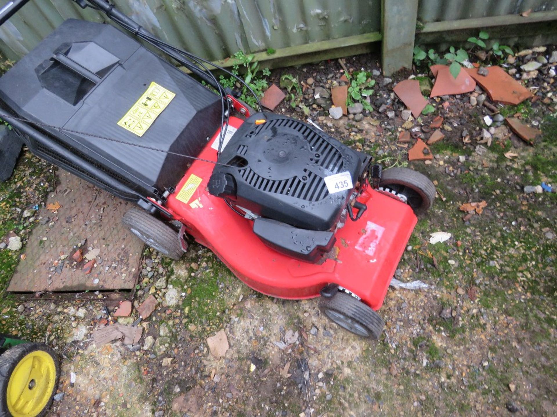 RED PETROL ENGINED LAWN MOWER, WITH BOX. THIS LOT IS SOLD UNDER THE AUCTIONEERS MARGIN SCHEME, TH