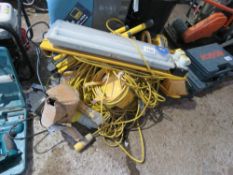 ASSORTED 110VOLT LIGHTS, SPLITTERS AND EXTENSION LEADS. THIS LOT IS SOLD UNDER THE AUCTIONEERS MA
