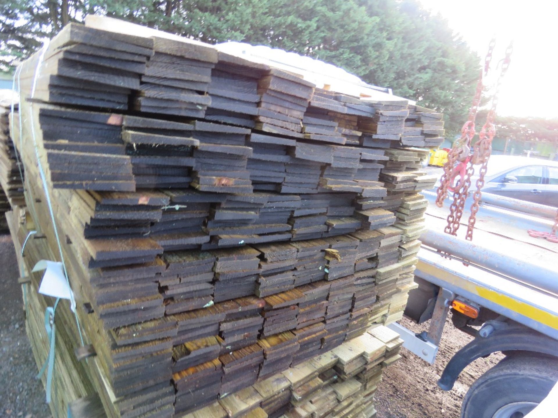 LARGE PACK OF FEATHEREDGE TREATED TIMBER CLADDING BOARDS. 1.8M LENGTH X 100MM WIDTH APPROX - Image 2 of 3