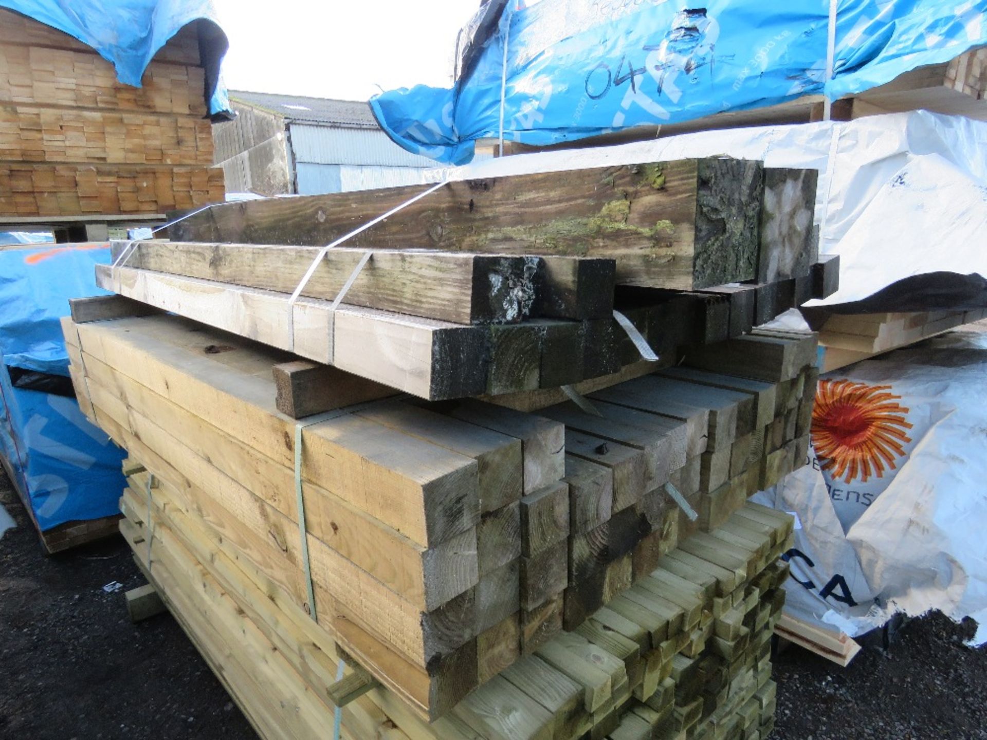 2 XBUNDLES OF TIMBER POSTS MAINLY 80MM X 80MM X 1.8M APPROX.