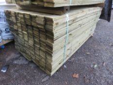 LARGE PACK OF TREATED FEATHEREDGE TIMBER CLADDING BOARDS. 1.8M LENGTH X 100MM WIDTH APPROX.