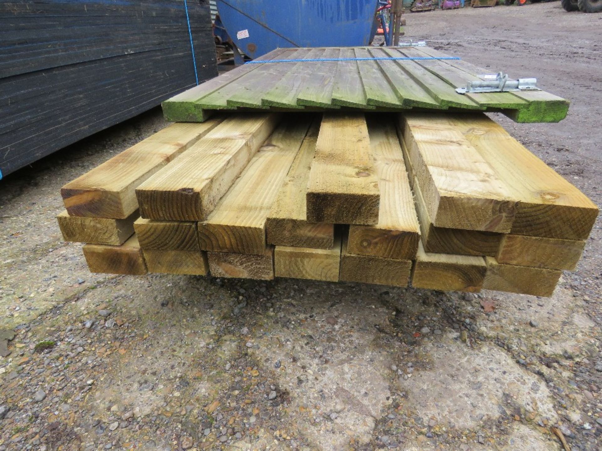 WOODEN GATE PLUS 19NO TIMBER POSTS 4" X 2" @ 2.4M LENGTH APPROX. THIS LOT IS SOLD UNDER THE AUCTI - Image 2 of 4