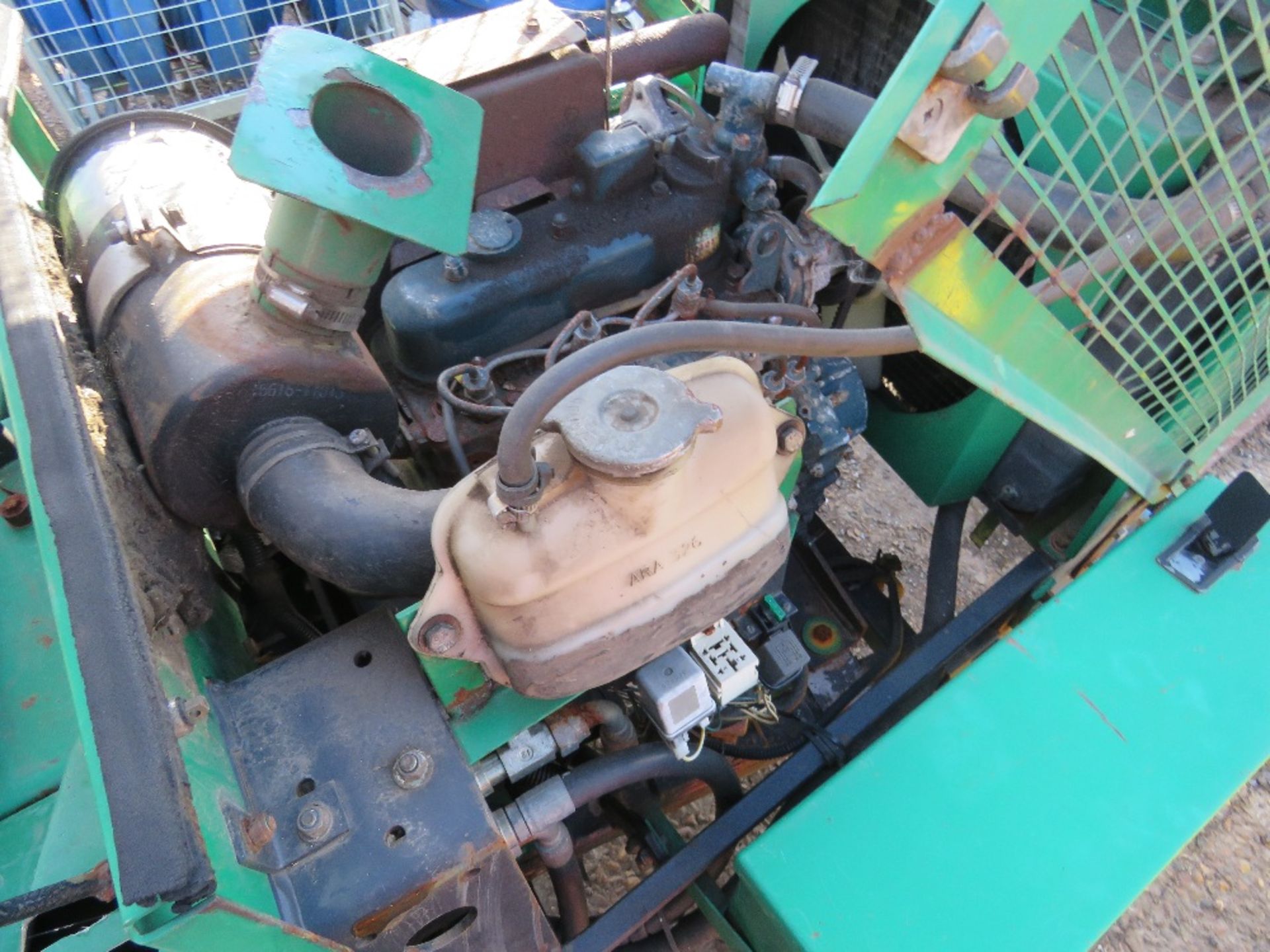 RANSOMES TRIPLE RIDE ON MOWER WITH KUBOTA ENGINE. BEEN IN STORAGE FOR SOME TIME. WHEN BRIEFLY TESTED - Image 8 of 12