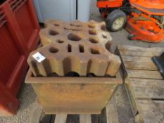 LARGE SWAGING BLOCK ON A STAND.