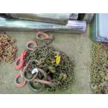 4 LEGGED LIFTING CHAINS WITH SHORTENERS. 12FT LENGTH APPROX. THIS LOT IS SOLD UNDER THE AUCTIONE