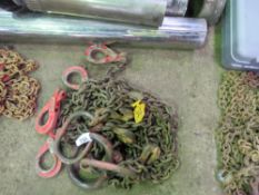 4 LEGGED LIFTING CHAINS WITH SHORTENERS. 12FT LENGTH APPROX. THIS LOT IS SOLD UNDER THE AUCTIONE