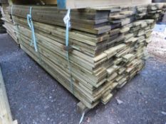 LARGE PACK OF FEATHEREDGE TREATED TIMBER CLADDING BOARDS. 1.8M LENGTH X 100MM WIDTH APPROX