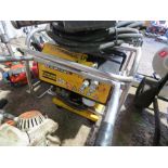 ATLAS COPCO HYDRAULIC BREAKER PACK WITH HOSE AND GUN.