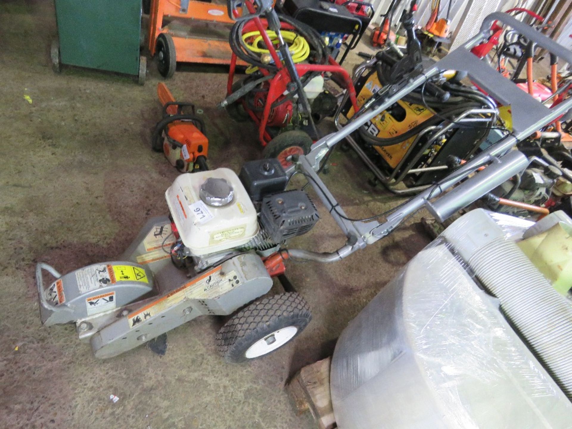 PETROL ENGINED STUMP GRINDER. WHEN TESTED WAS SEEN TO RUN AND HEAD TURNED (ENGINE SMOKEY).